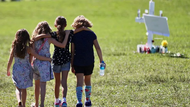 C.M. Guerrero, The Miami Herald Via AP - A vigil post in Parkland, Fla., in February 2018.