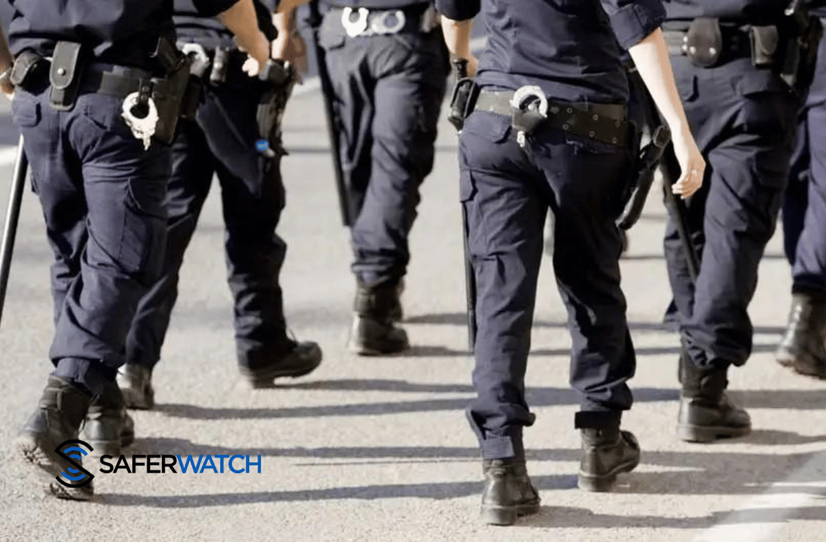 _group of police walking - SaferWatch