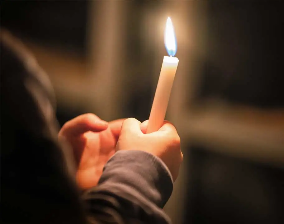 holding candle