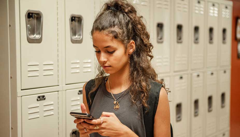 Student girl on cell phone