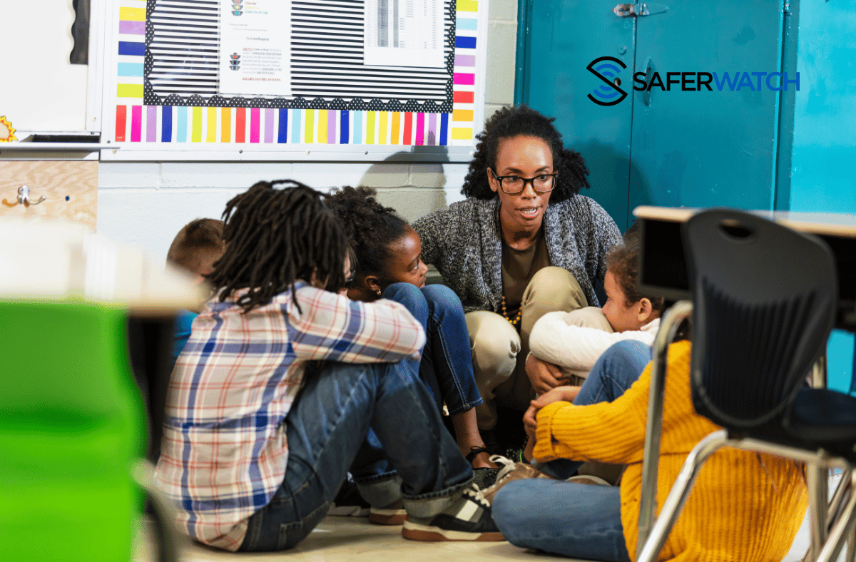 teacher conducting a safety drill in a classroom - SaferWatch