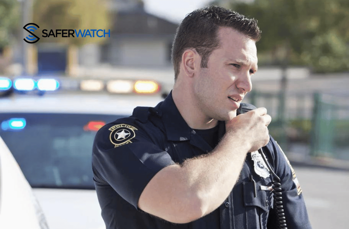 cop on a radio - SaferWatch