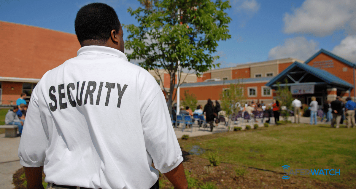 A team of security personnel assessing potential risks of an event